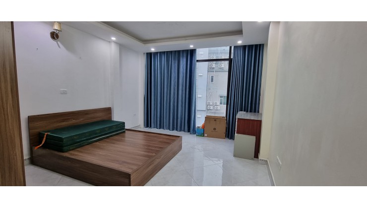 bán nhà phố trần thái tông 50 m2 7 tầng thang máy gara ô tô giá 13.9 tỷ