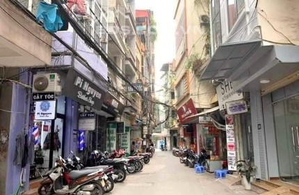 Nhà Tây Sơn Phân Lô - ôtô đỗ cửa - KD đẹp 70m2, 5 tầng, mặt tiền 7m, 2 mặt thoáng, 7,1 tỷ.