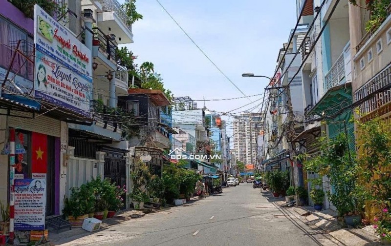 BÁN NHÀ MẶT PHỐ QUẬN 7 - VỊ TRÍ VÀNG - 6.9 TỶ - 4 TẦNG, 4 PN, SỔ HỒNG