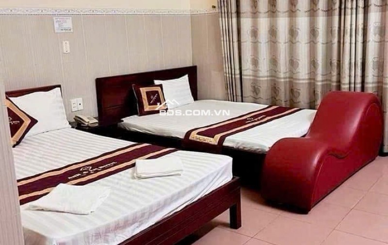 BÁN GẤP KHÁCH SẠN 7 TẦNG MẶT TIỀN HÀ HUY GIÁP - KHU NAM LONG THẠNH LỘC NGANG KHỦNG 9M-