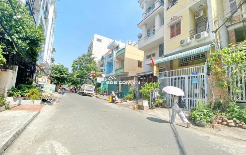 Xuất cảnh CHDV 15 phòng mặt tiền 93 đường số 49 Tân Quy Q7 giá 27.4 tỷ