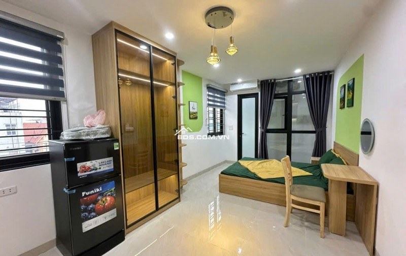 Bán tòa nhà căn hộ dịch vụ phố Chùa Láng DT 85m2, 7  tầng thang máy, gần Đại học Ngoại thương, doanh thu 100tr/ tháng