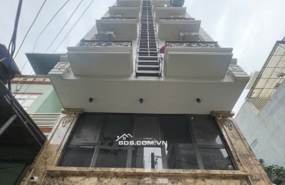 Bán tòa nhà căn hộ dịch vụ phố Chùa Láng DT 85m2, 7  tầng thang máy, gần Đại học Ngoại thương, doanh thu 100tr/ tháng