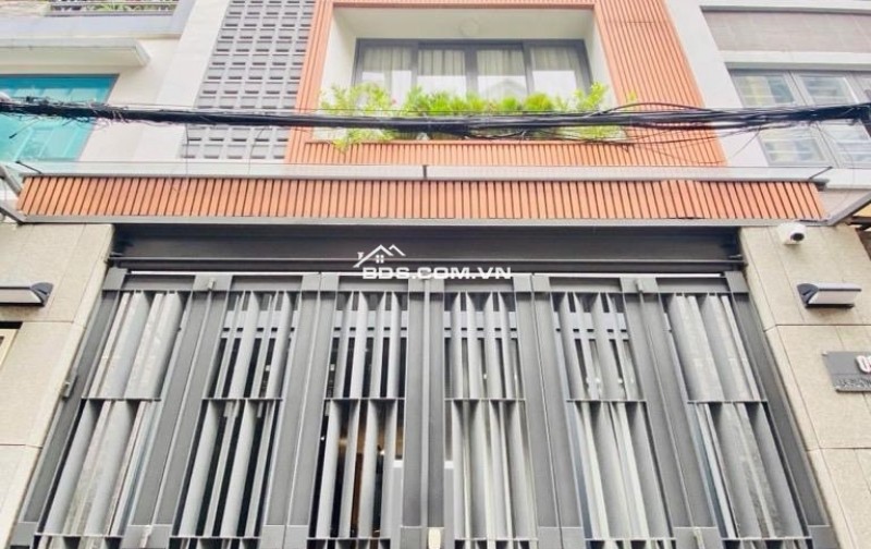Bán gấp nhà hẻm xe hơi đường C1, Tân Bình: 84m2, 4 tầng, 4PN, sổ đỏ trao tay, giá hời chỉ 18.5 tỷ! Gọi ngay 0789892658.