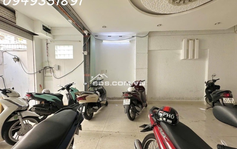  NHÀ CHDV - 12 PHÒNG - 2 MẶT THOÁNG - HẺM Ô TÔ NƠ TRANG LONG P7 BÌNH THẠNH