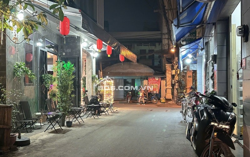 Bán CHDV hẻm 8m Quang Trung ngang 6.7m 134m2 6 lầu 21PN T.máy DT 115tr 26 tỷ gần chợ.