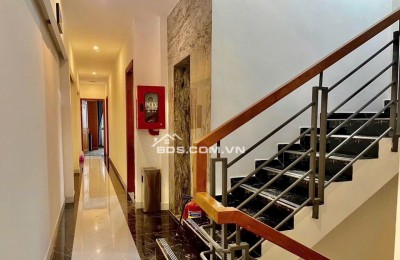 Bán CHDV hẻm 8m Quang Trung ngang 6.7m 134m2 6 lầu 21PN T.máy DT 115tr 26 tỷ gần chợ.