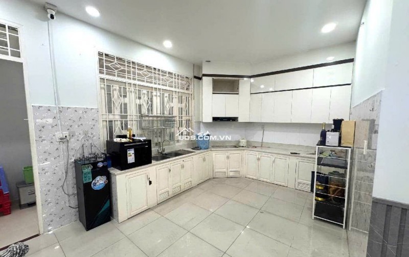 Bán nhà mặt tiền 10m sát chợ HTT Quang Trung ngang 5.4m 103m2 tiện xây mới 10.5 tỷ.