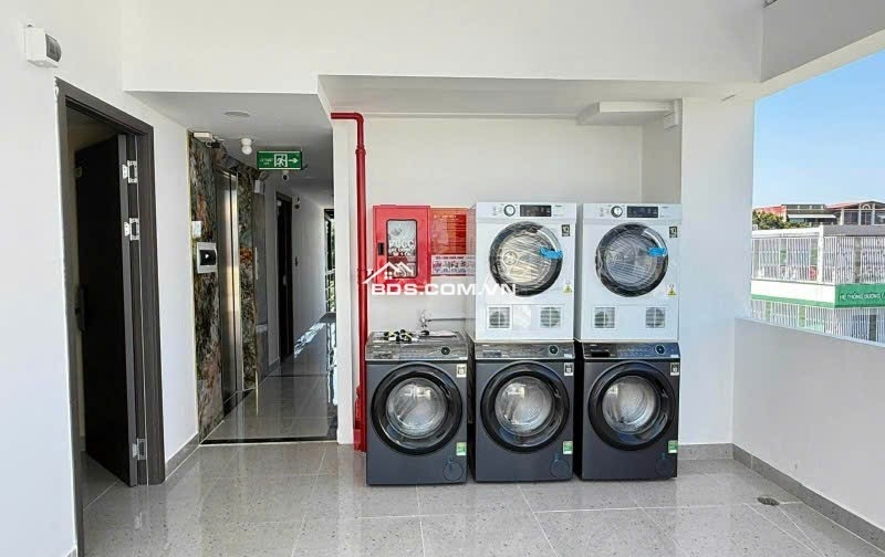 CHDV 7 lầu mới 169m2 ngang 6.5m xe du lịch tới Phạm Văn Chiêu gần chợ 30PN T.máy 29.9  tỷ.