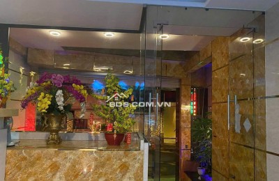 Khách sạn 7 tầng 2 sao hầm T.máy 22P 5.6m 125m2 MT gần Thống Nhất DT 180tr chỉ 23 tỷ.