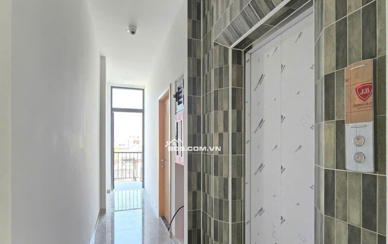 CHDV 7L mới DTS 650m2 HXT Bùi Đình Túy có hầm 25PN TN 130tr gần chợ Bà Chiểu 37.8 tỷ.
