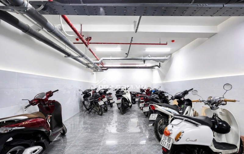 CHDV 7L mới DTS 650m2 HXT Bùi Đình Túy có hầm 25PN TN 130tr gần chợ Bà Chiểu 37.8 tỷ.