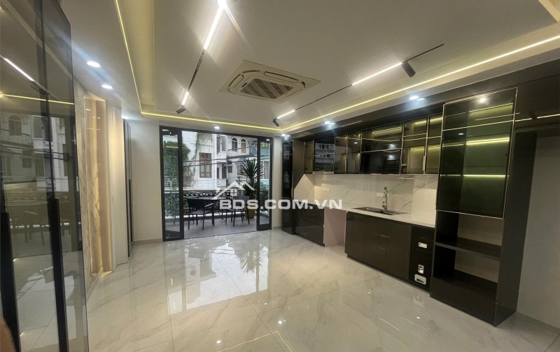 Siêu phẩm nhà đẹp mặt đường Đông Trà 5 tầng thang máy ô tô đỗ cửa kinhdoanh buôn bán tốt