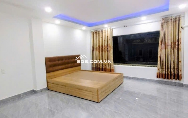 Bán CHDV 4 lầu hẻm 1 sẹc 310 Dương Quảng Hàm ngang 4.5m 86m2 9PN khoán 30tr chỉ 11.5 tỷ.