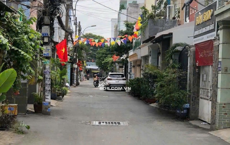 Bán nhà đẹp 6 lầu hẻm 535 Thống Nhất 100m2 có T.máy gần trường Phan Tây Hồ tặng NT 12.8 tỷ