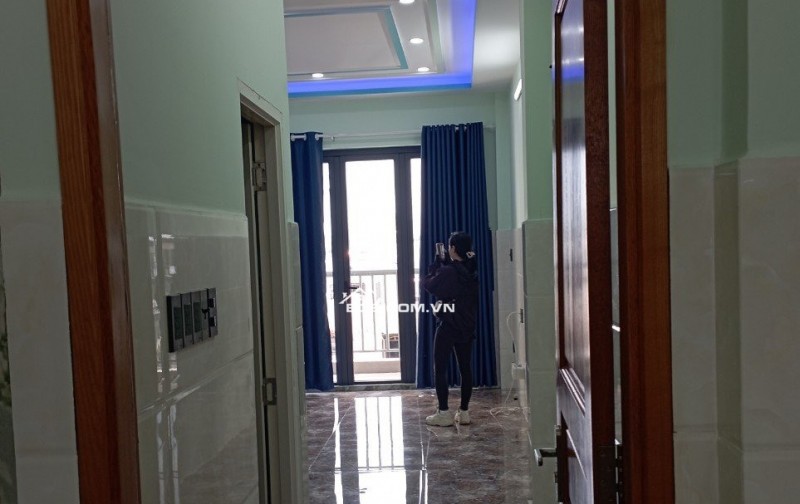 Bán CHDV 4 lầu hẻm 1 sẹc 310 Dương Quảng Hàm ngang 4.5m 86m2 9PN khoán 30tr chỉ 11.5 tỷ.
