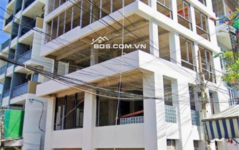 Toà căn hộ 7 tầng bên hông chung cư Vĩnh Phước, sát đường 2/4: 50m. Giá: 20 tỷ