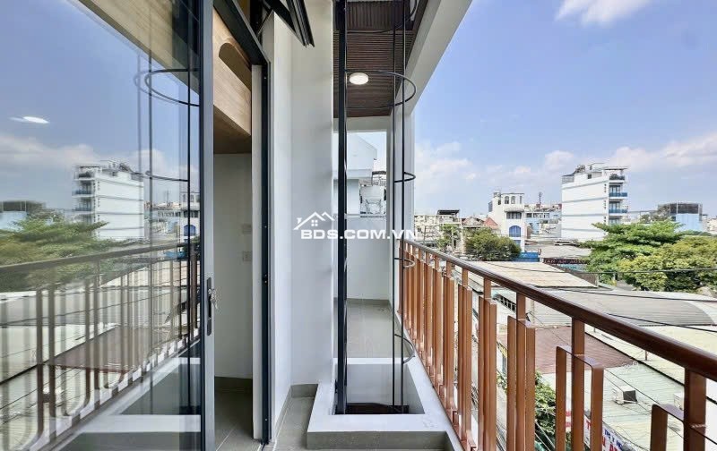 Bán CHDV 6 tầng hẻm 8m Lê Đức Thọ 105m2 ngang 5.1m 16PN có thang máy TN 100tr chỉ 23.5 tỷ.