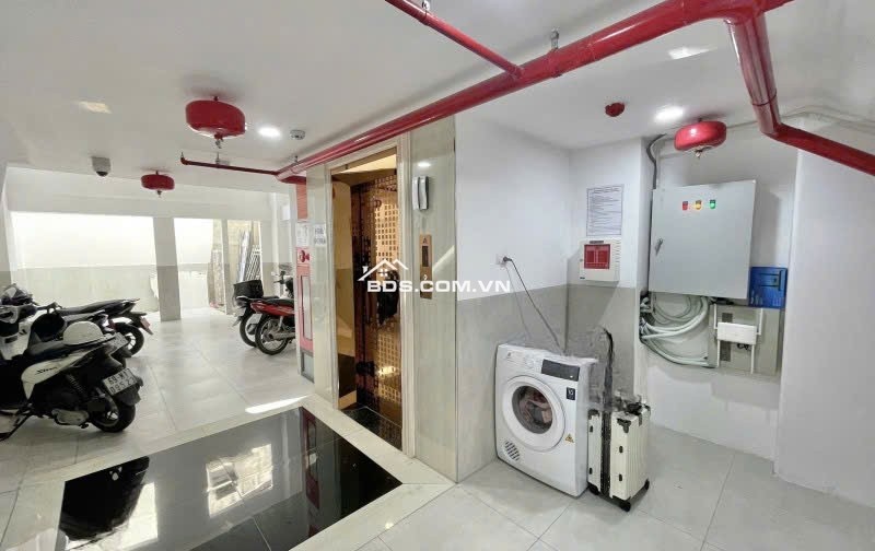 Bán CHDV 6 tầng hẻm 8m Lê Đức Thọ 105m2 ngang 5.1m 16PN có thang máy TN 100tr chỉ 23.5 tỷ.