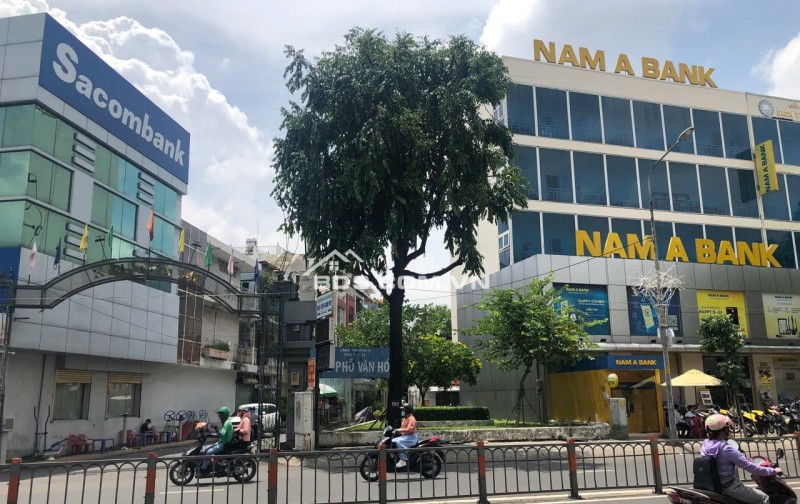 Bán GẤP nhà đẹp 7 lầu HXT Quang Trung có hầm TM ngang 6.5m 150m2 ngay Ủy ban 22.99 tỷ.