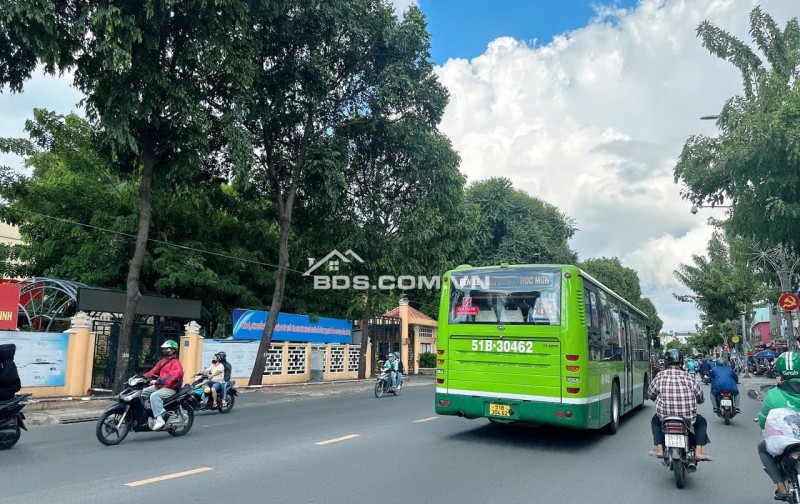 Bán GẤP nhà đẹp 7 lầu HXT Quang Trung có hầm TM ngang 6.5m 150m2 ngay Ủy ban 22.99 tỷ.
