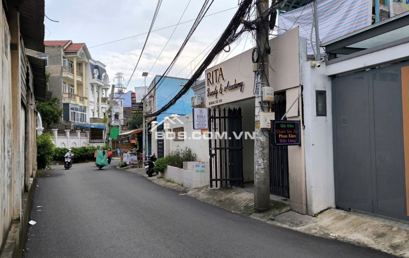 Ở trên lầu, kinh doanh dưới trệt — nhà MT Quang Trung Thủ Đức, sát trường học và ga Metro