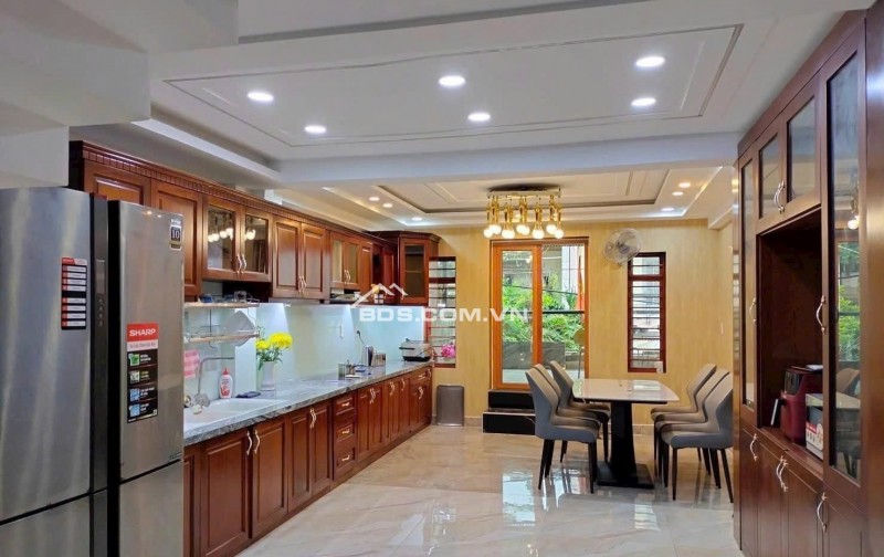Nhỉnh 17 tỷ có nhà 5 lầu T.máy tặng NT cao cấp HXT 1 trục Nguyễn Oanh 105m2(5x21) gần chợ.